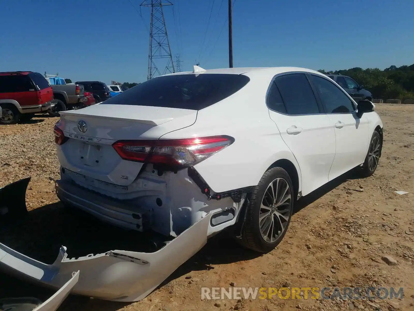 4 Photograph of a damaged car 4T1B11HK0KU689174 TOYOTA CAMRY 2019