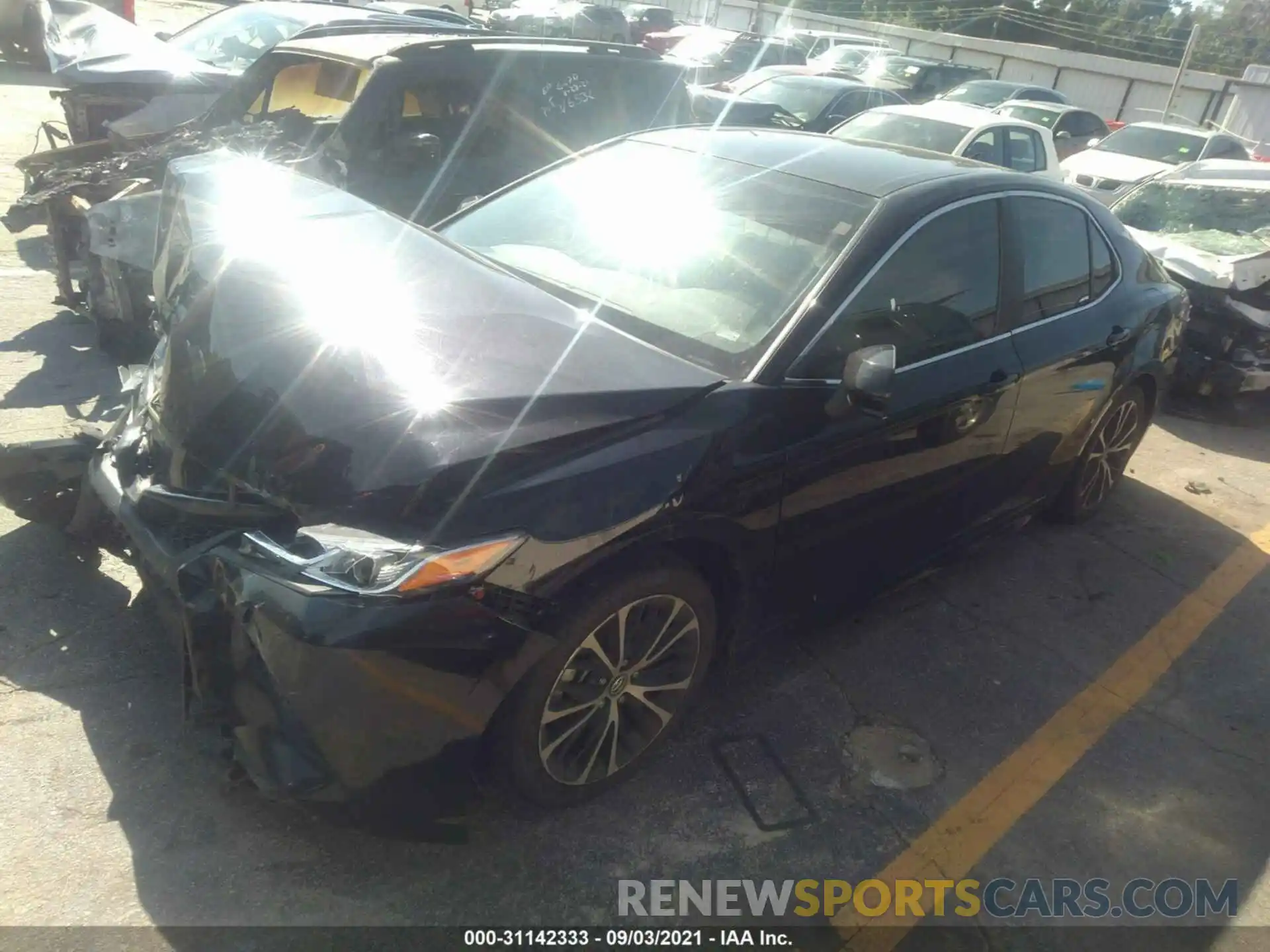 2 Photograph of a damaged car 4T1B11HK0KU689255 TOYOTA CAMRY 2019