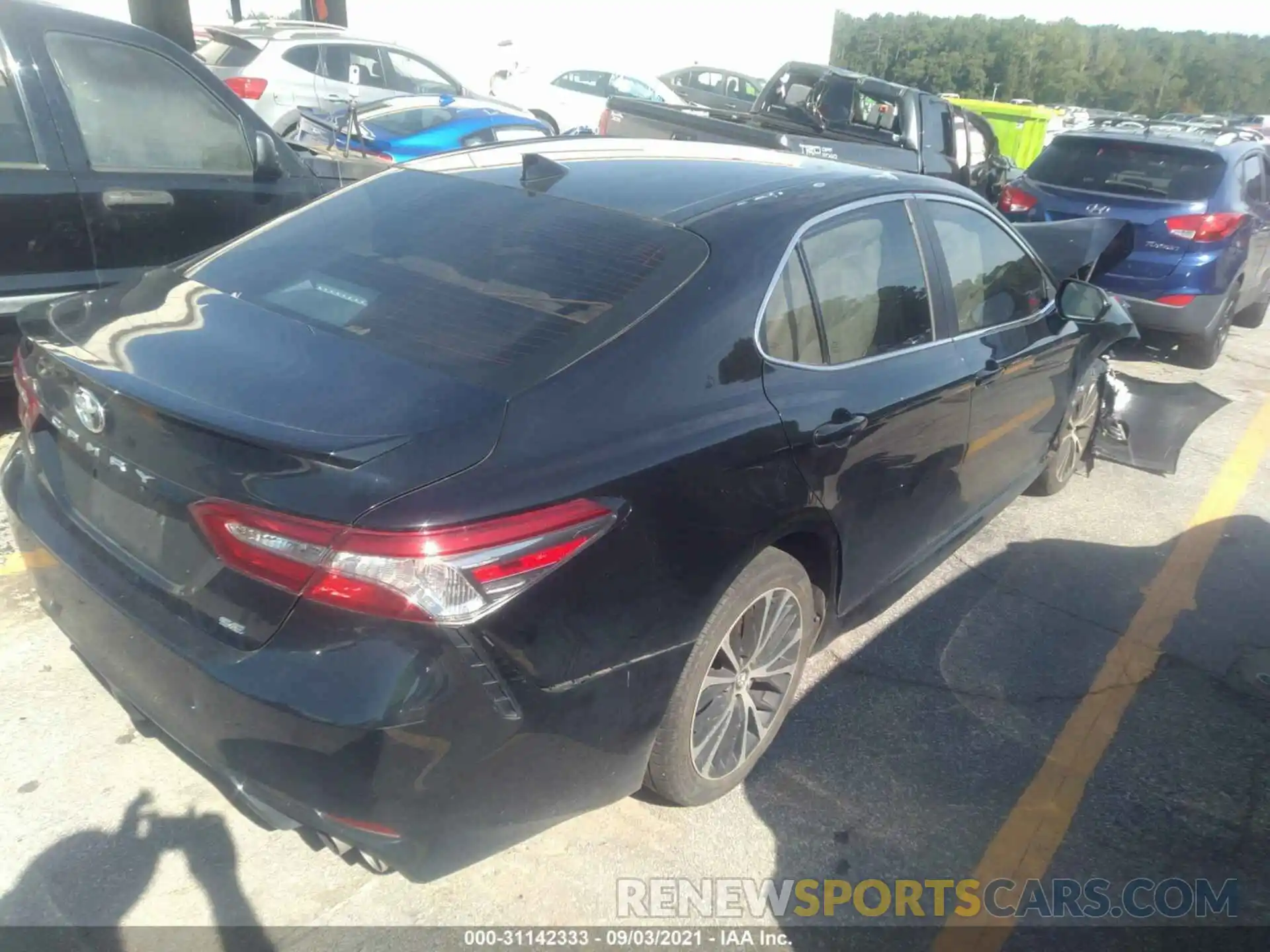 4 Photograph of a damaged car 4T1B11HK0KU689255 TOYOTA CAMRY 2019