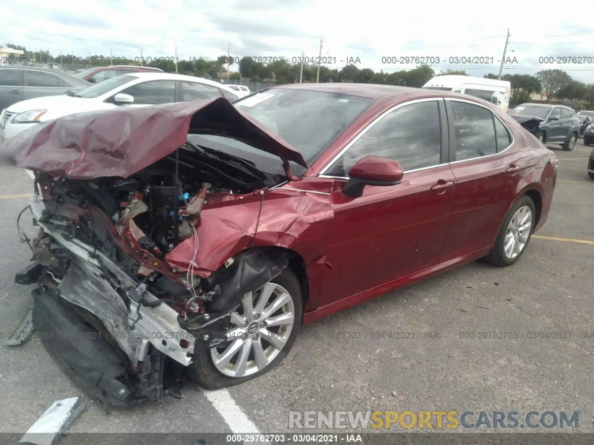 2 Photograph of a damaged car 4T1B11HK0KU692141 TOYOTA CAMRY 2019