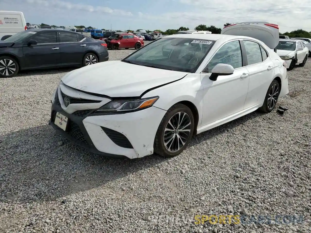 2 Photograph of a damaged car 4T1B11HK0KU696609 TOYOTA CAMRY 2019