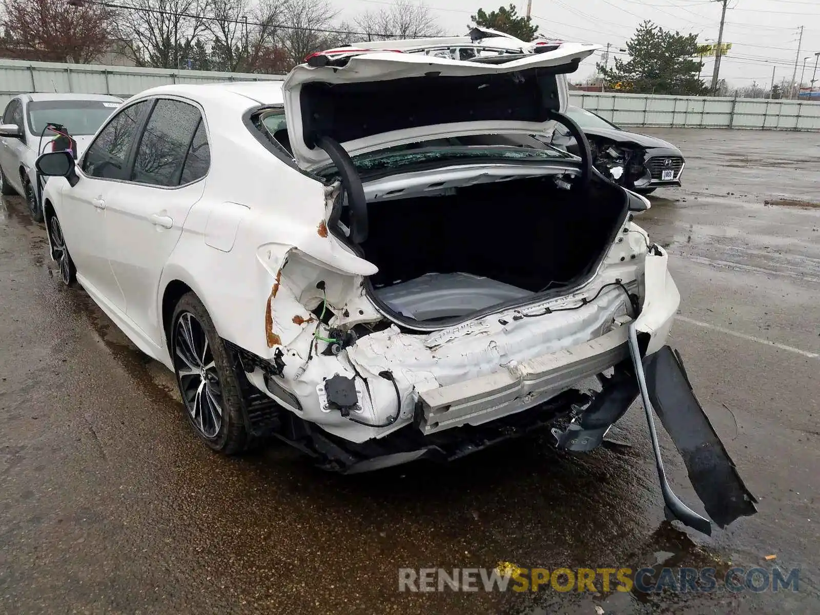 3 Photograph of a damaged car 4T1B11HK0KU699879 TOYOTA CAMRY 2019