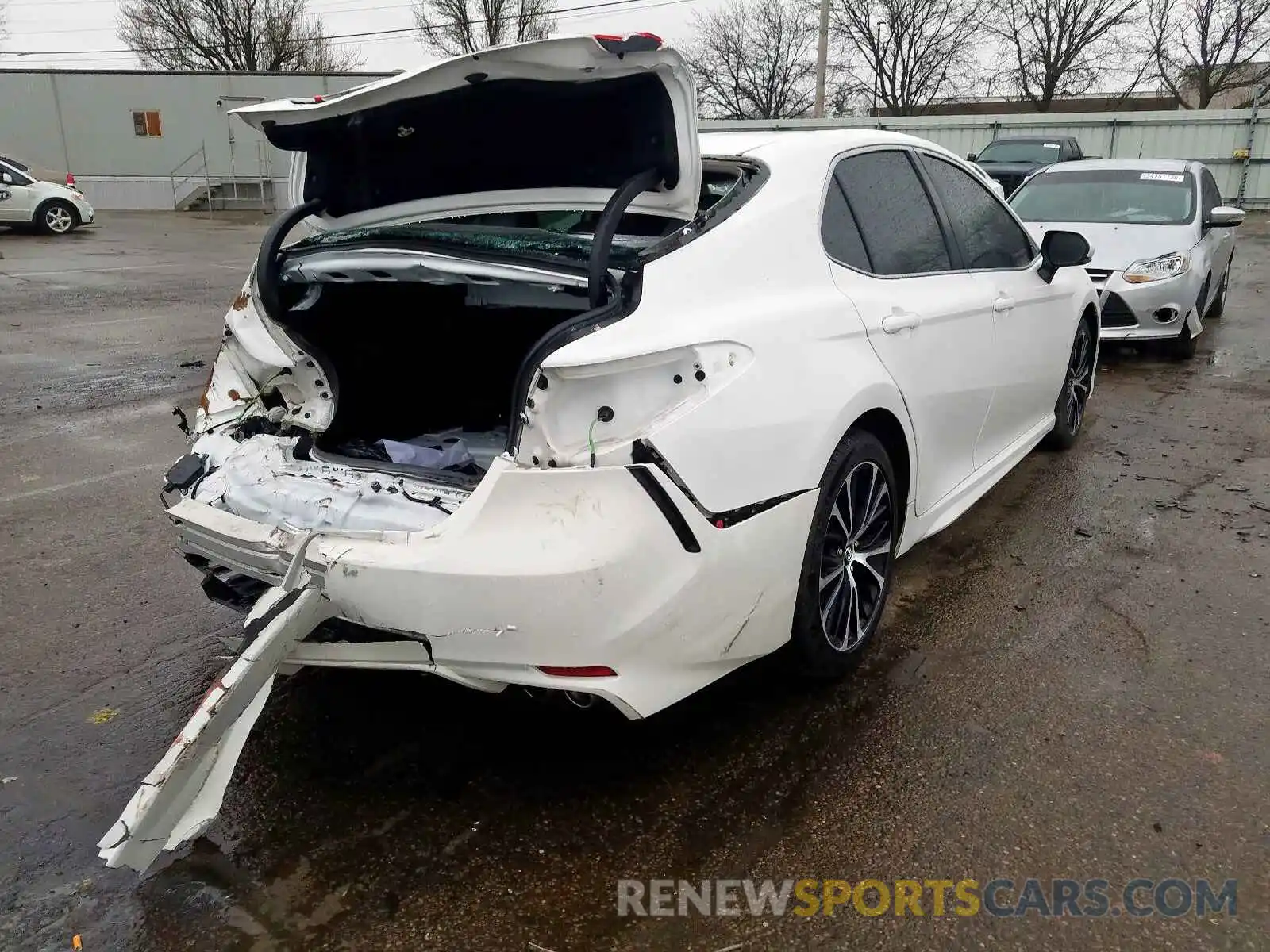 4 Photograph of a damaged car 4T1B11HK0KU699879 TOYOTA CAMRY 2019