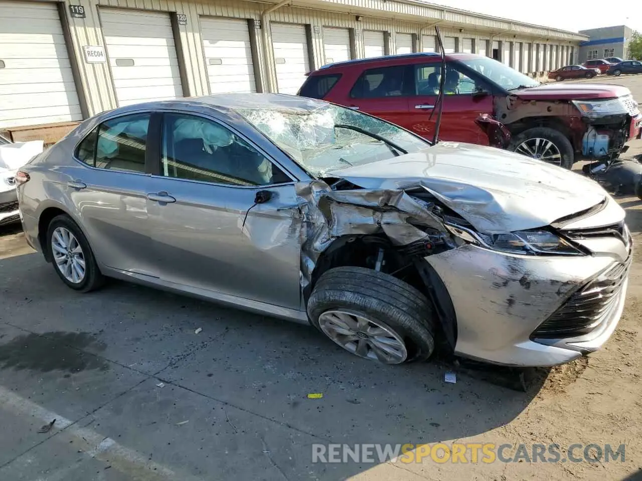 4 Photograph of a damaged car 4T1B11HK0KU700660 TOYOTA CAMRY 2019
