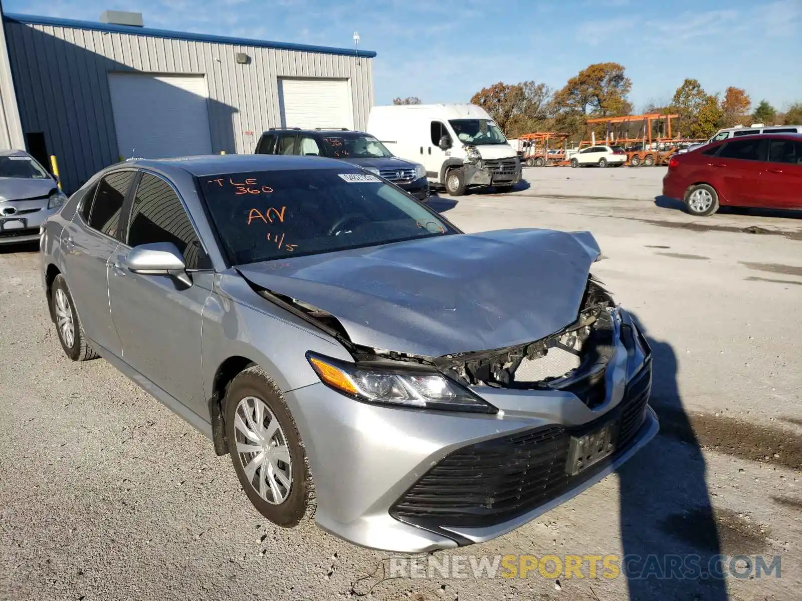 1 Photograph of a damaged car 4T1B11HK0KU701257 TOYOTA CAMRY 2019