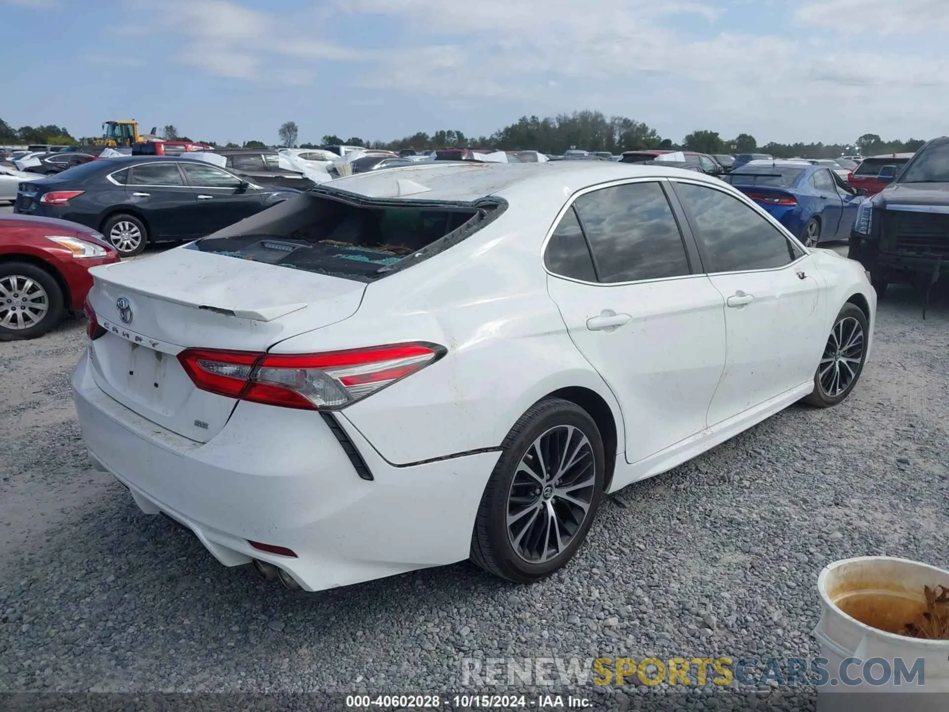 4 Photograph of a damaged car 4T1B11HK0KU702053 TOYOTA CAMRY 2019