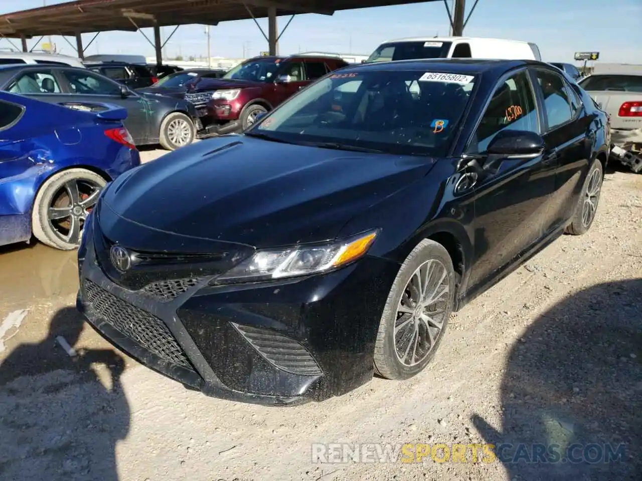 2 Photograph of a damaged car 4T1B11HK0KU703395 TOYOTA CAMRY 2019