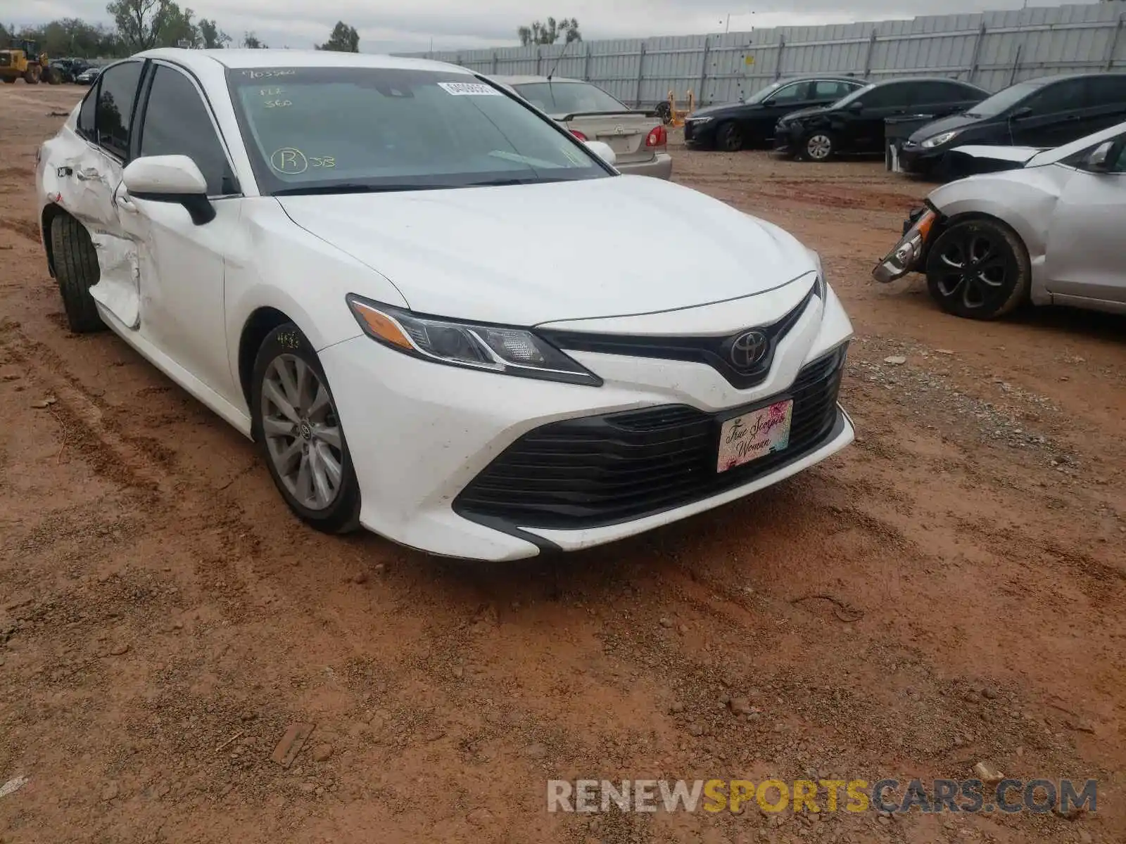 1 Photograph of a damaged car 4T1B11HK0KU703560 TOYOTA CAMRY 2019