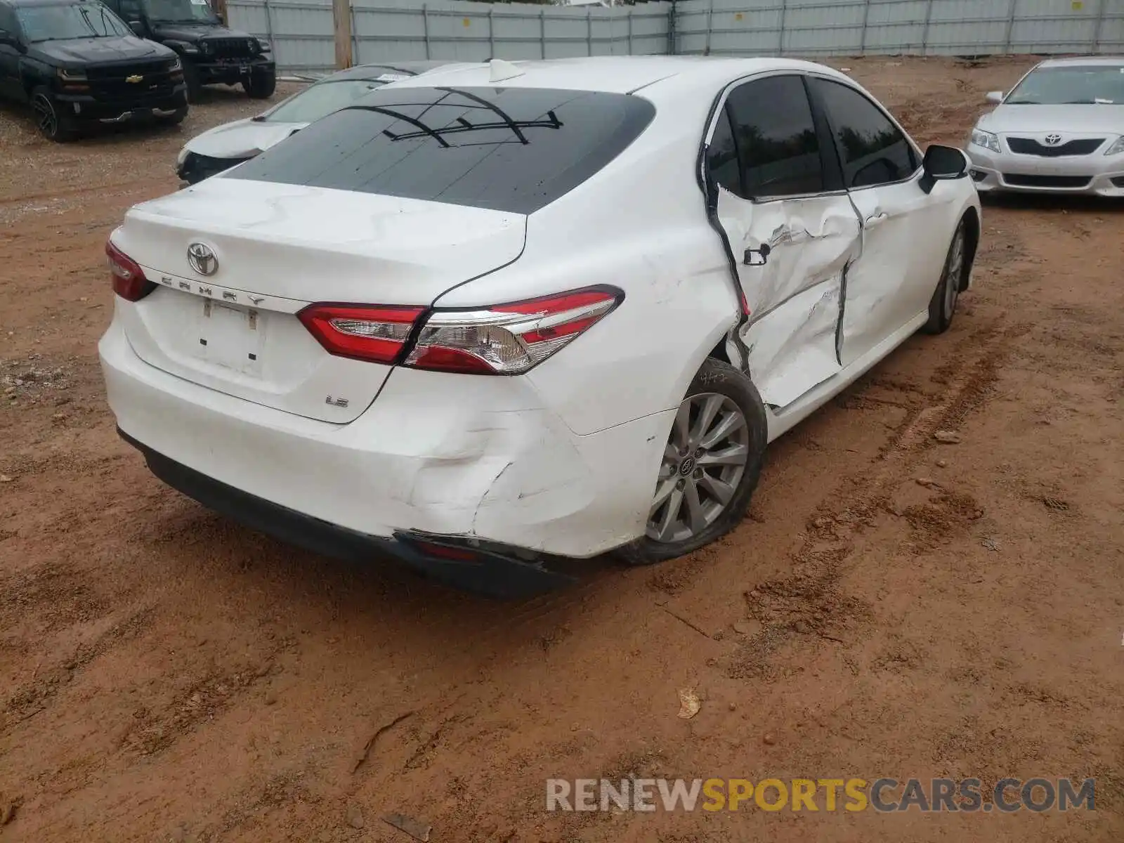 4 Photograph of a damaged car 4T1B11HK0KU703560 TOYOTA CAMRY 2019