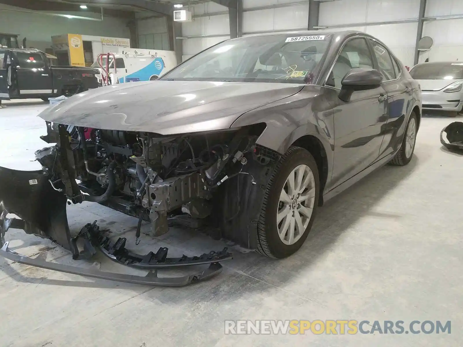 2 Photograph of a damaged car 4T1B11HK0KU703980 TOYOTA CAMRY 2019