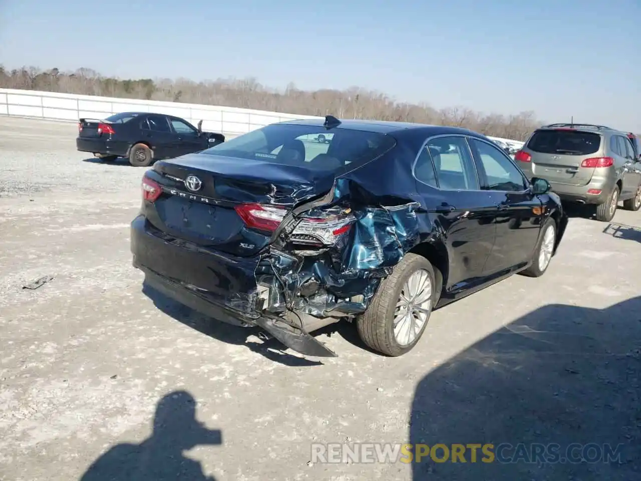 4 Photograph of a damaged car 4T1B11HK0KU705387 TOYOTA CAMRY 2019