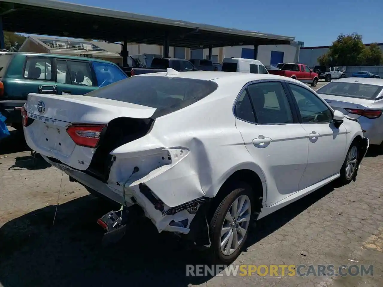 4 Photograph of a damaged car 4T1B11HK0KU705695 TOYOTA CAMRY 2019