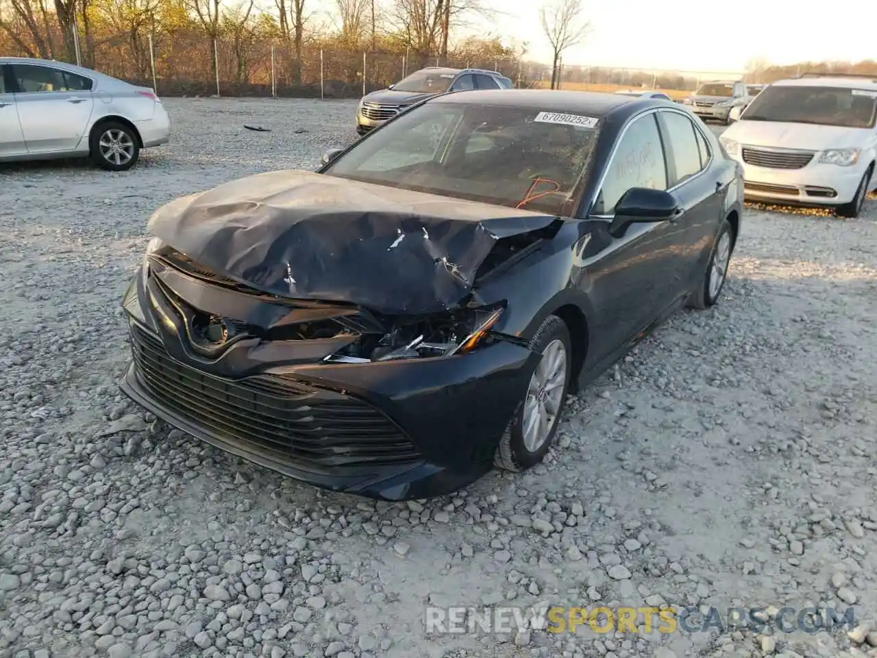 2 Photograph of a damaged car 4T1B11HK0KU711772 TOYOTA CAMRY 2019