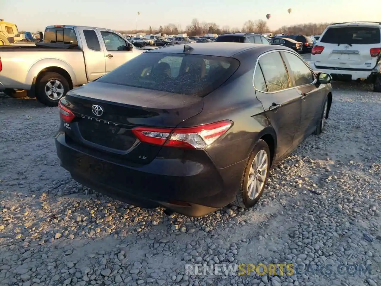 4 Photograph of a damaged car 4T1B11HK0KU711772 TOYOTA CAMRY 2019