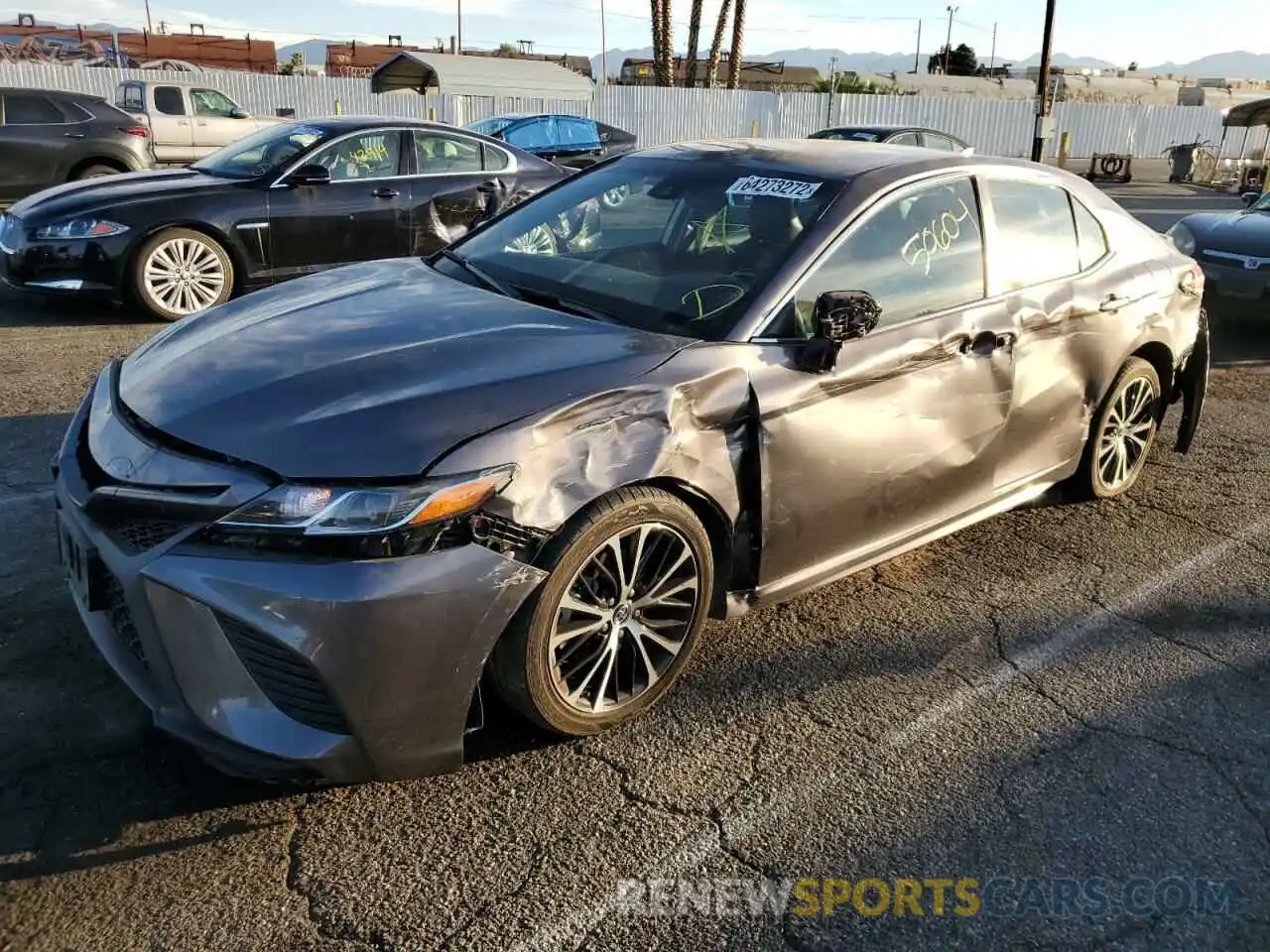 2 Photograph of a damaged car 4T1B11HK0KU713215 TOYOTA CAMRY 2019