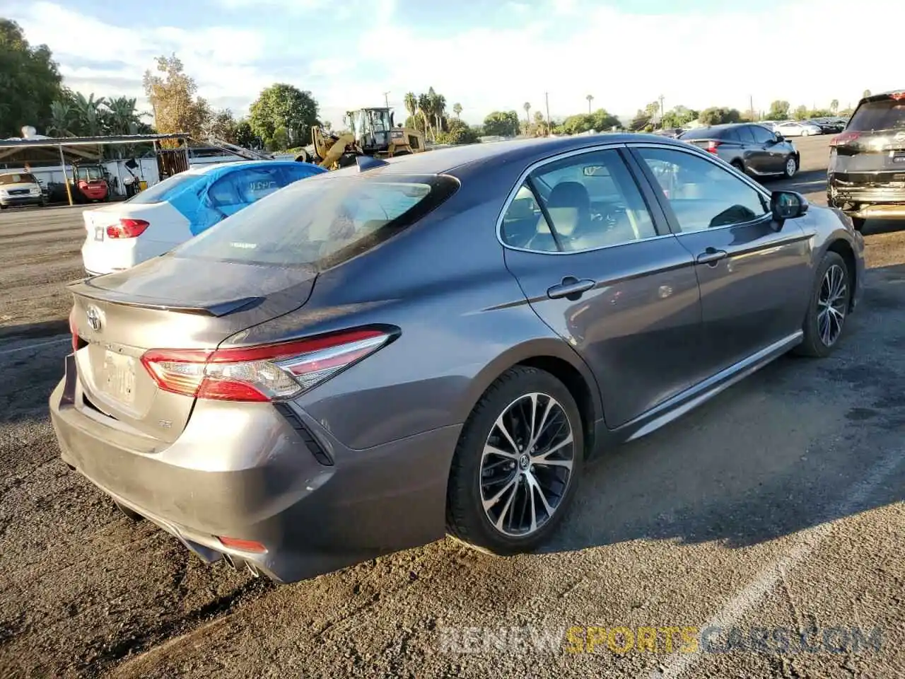 4 Photograph of a damaged car 4T1B11HK0KU713215 TOYOTA CAMRY 2019