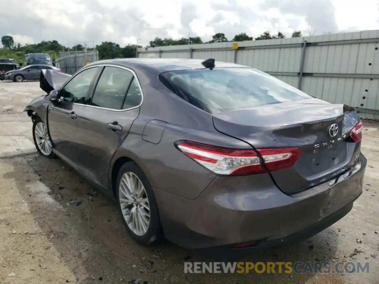 3 Photograph of a damaged car 4T1B11HK0KU713814 TOYOTA CAMRY 2019