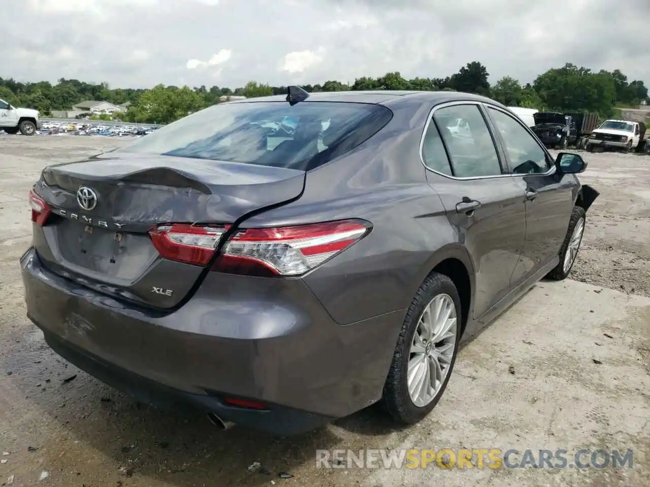 4 Photograph of a damaged car 4T1B11HK0KU713814 TOYOTA CAMRY 2019