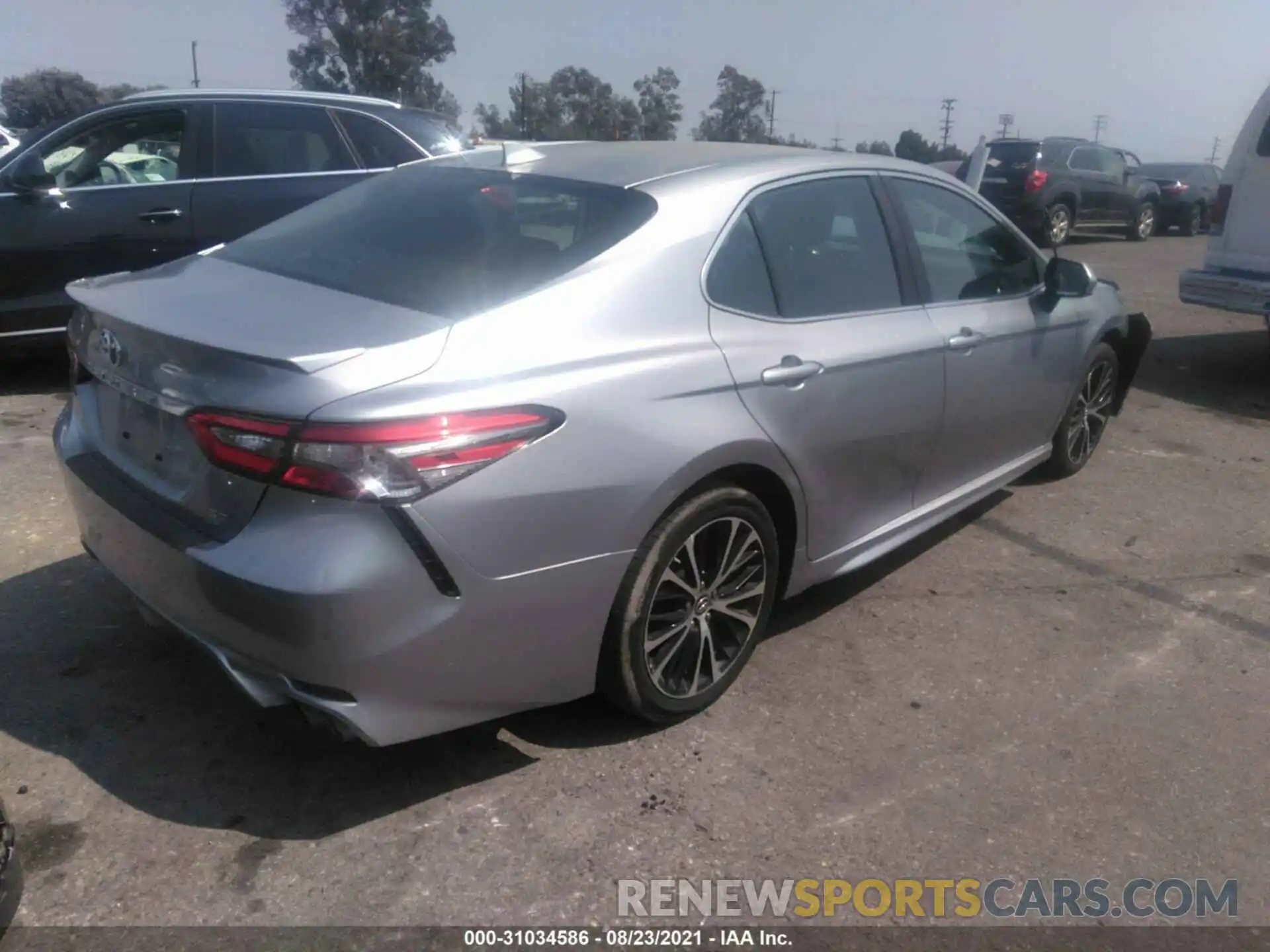 4 Photograph of a damaged car 4T1B11HK0KU714185 TOYOTA CAMRY 2019