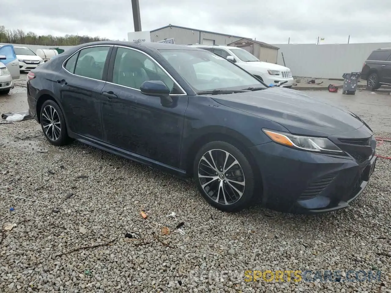 4 Photograph of a damaged car 4T1B11HK0KU714462 TOYOTA CAMRY 2019