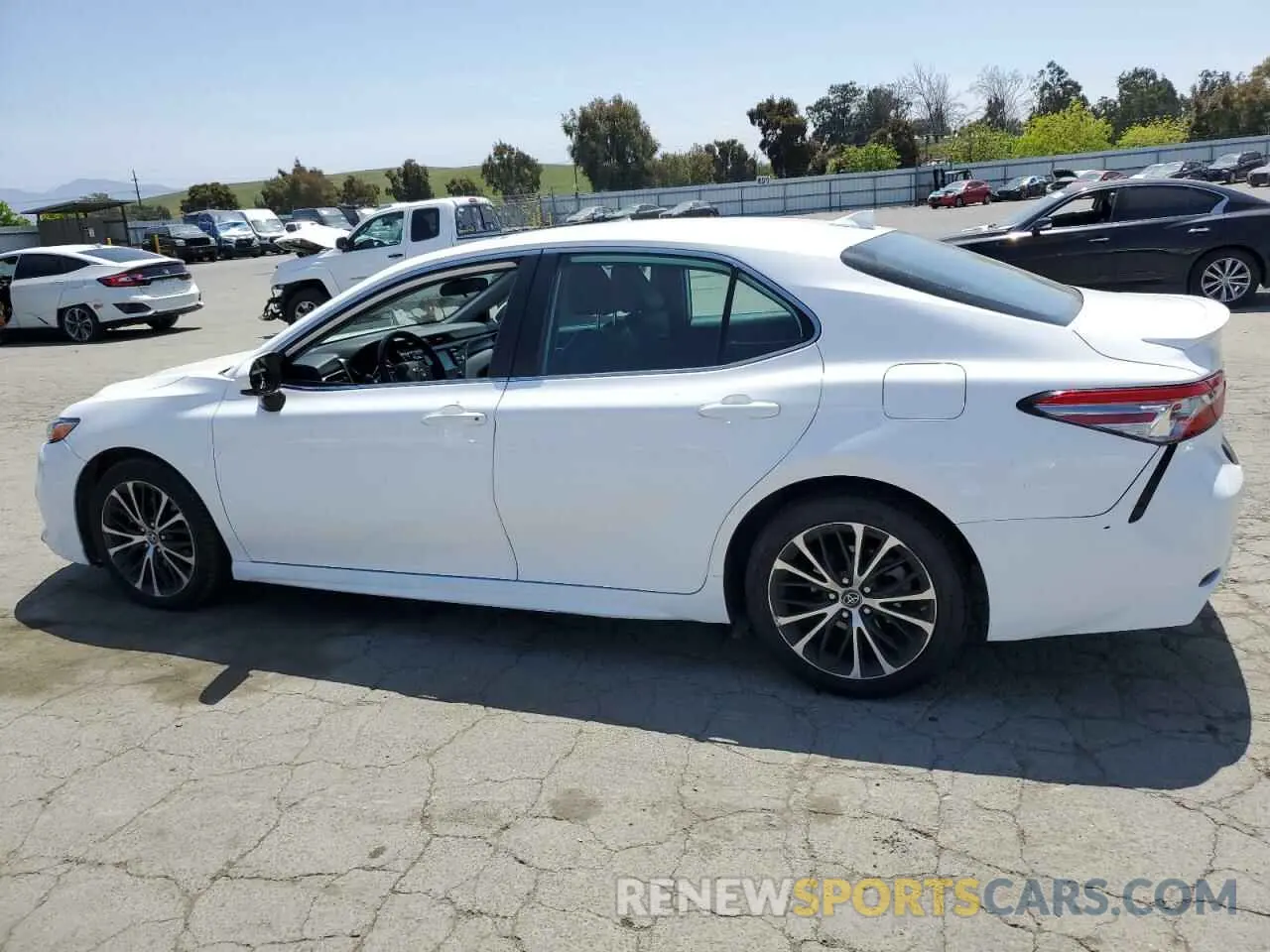 2 Photograph of a damaged car 4T1B11HK0KU714879 TOYOTA CAMRY 2019