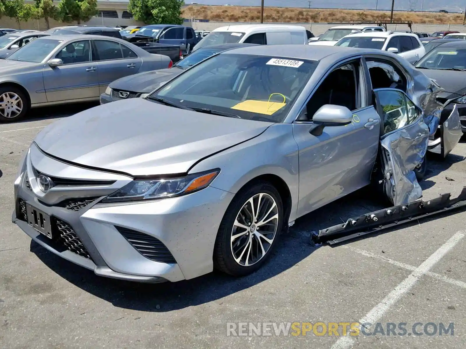 2 Photograph of a damaged car 4T1B11HK0KU715336 TOYOTA CAMRY 2019