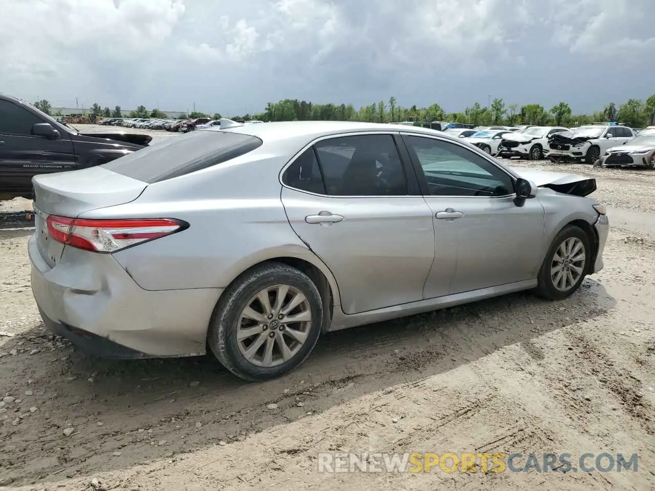 3 Photograph of a damaged car 4T1B11HK0KU719306 TOYOTA CAMRY 2019