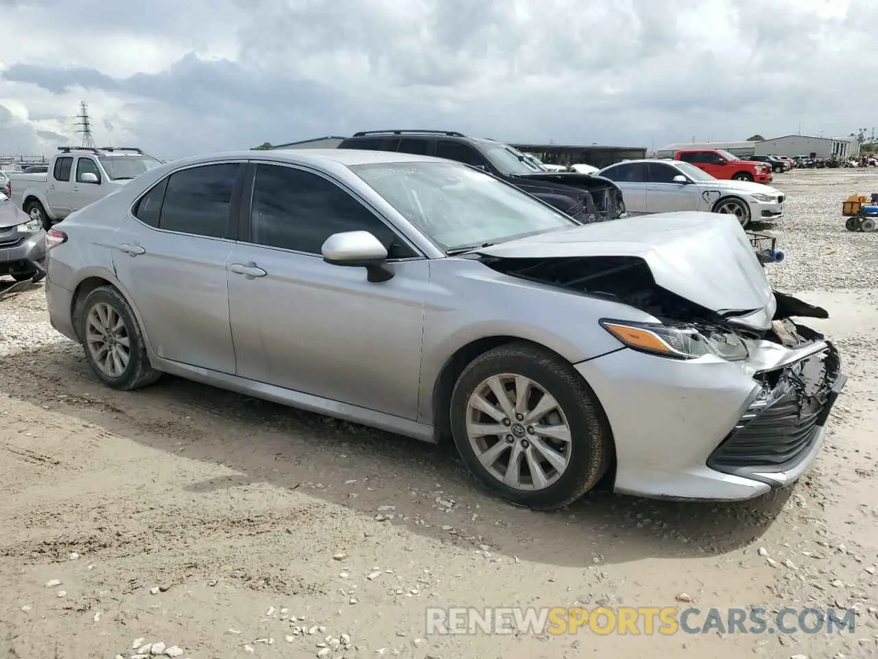 4 Photograph of a damaged car 4T1B11HK0KU719306 TOYOTA CAMRY 2019