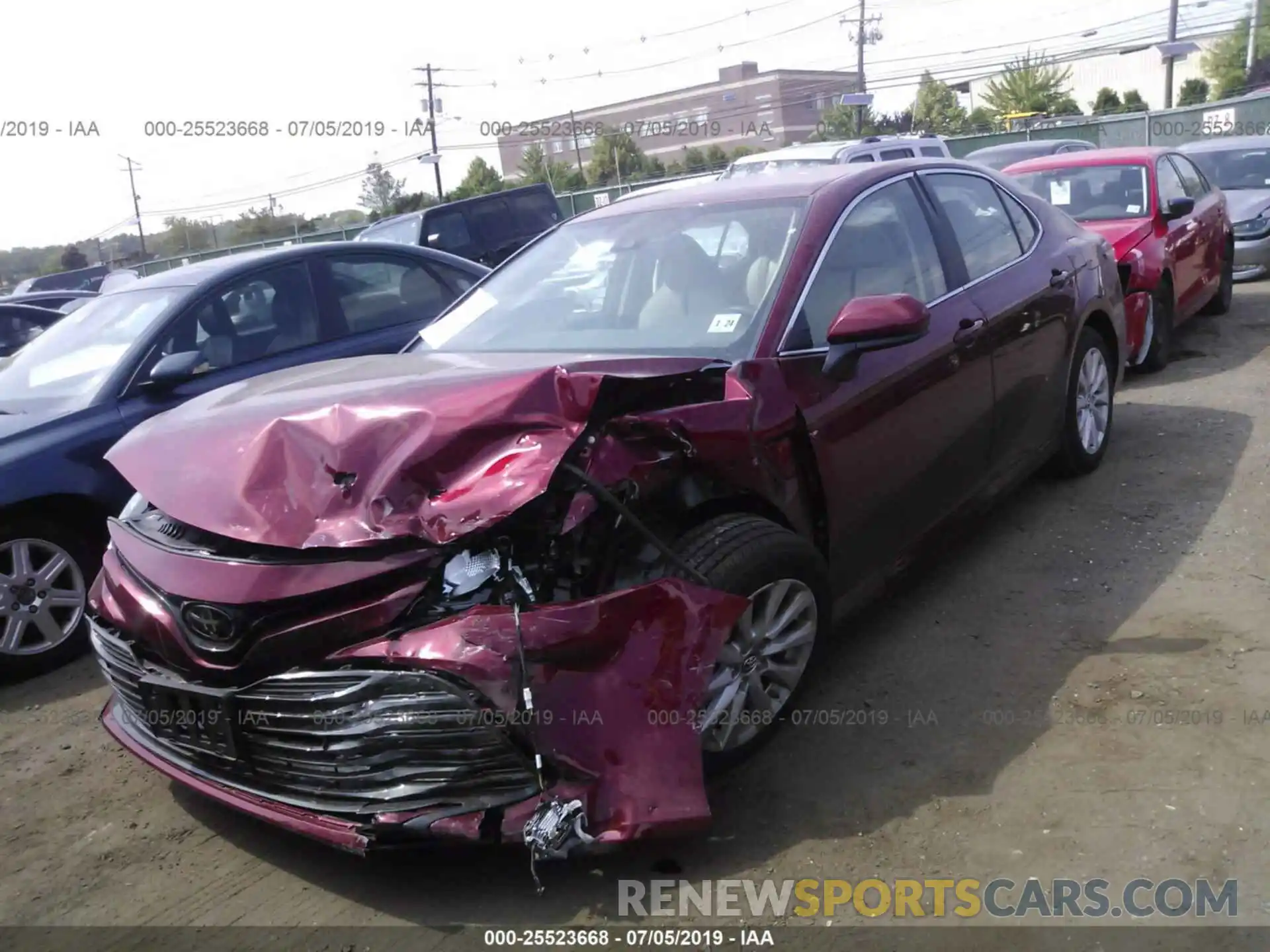 2 Photograph of a damaged car 4T1B11HK0KU721895 TOYOTA CAMRY 2019