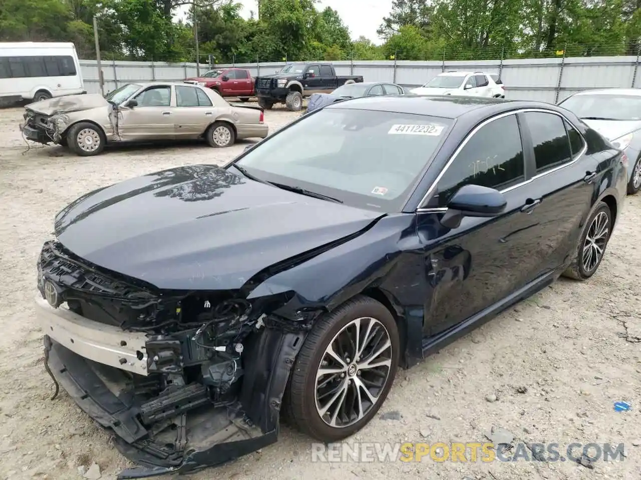 2 Photograph of a damaged car 4T1B11HK0KU729754 TOYOTA CAMRY 2019