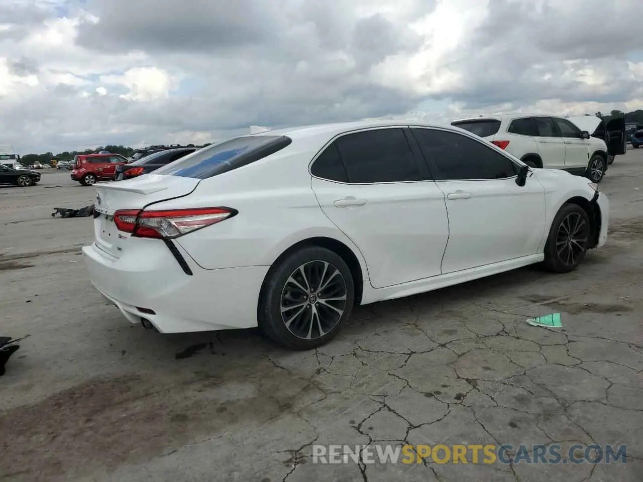 3 Photograph of a damaged car 4T1B11HK0KU733500 TOYOTA CAMRY 2019