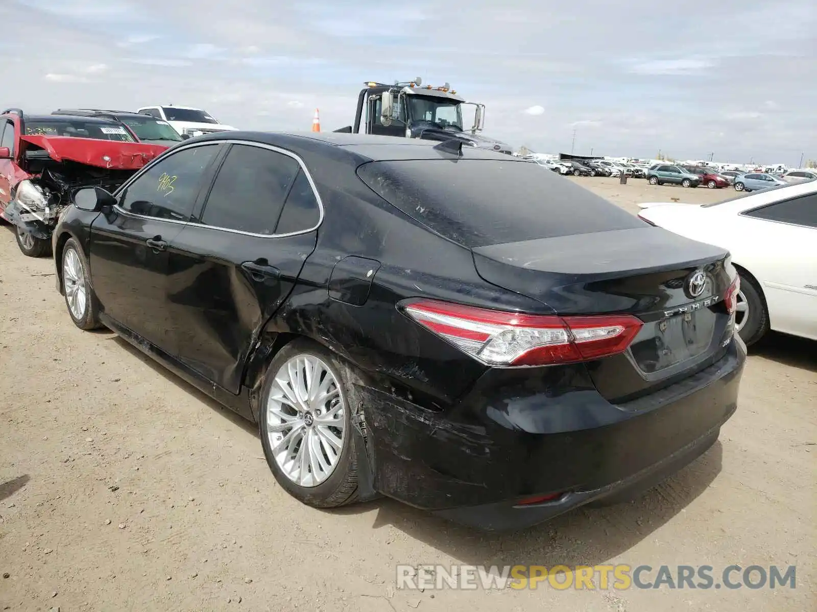 3 Photograph of a damaged car 4T1B11HK0KU741001 TOYOTA CAMRY 2019