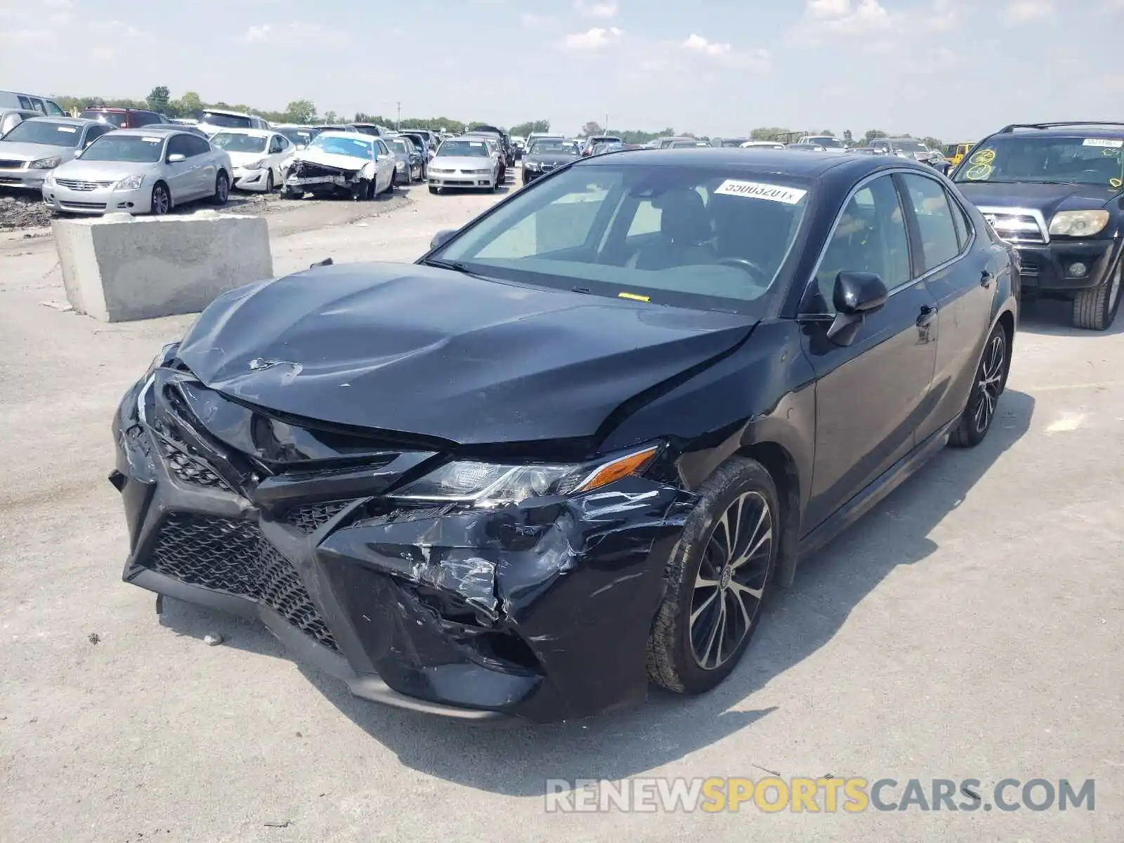 2 Photograph of a damaged car 4T1B11HK0KU743119 TOYOTA CAMRY 2019