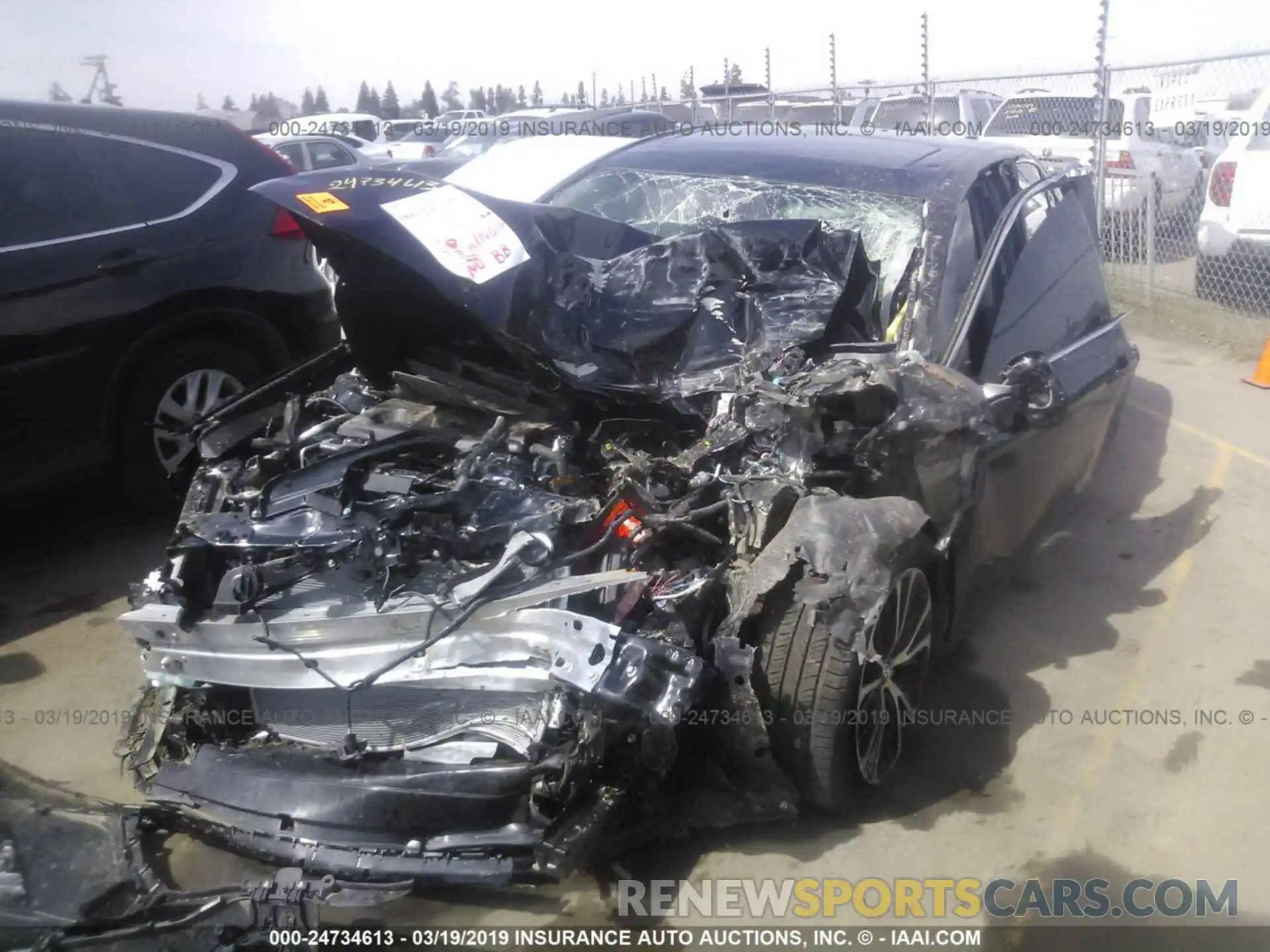 2 Photograph of a damaged car 4T1B11HK0KU743783 TOYOTA CAMRY 2019