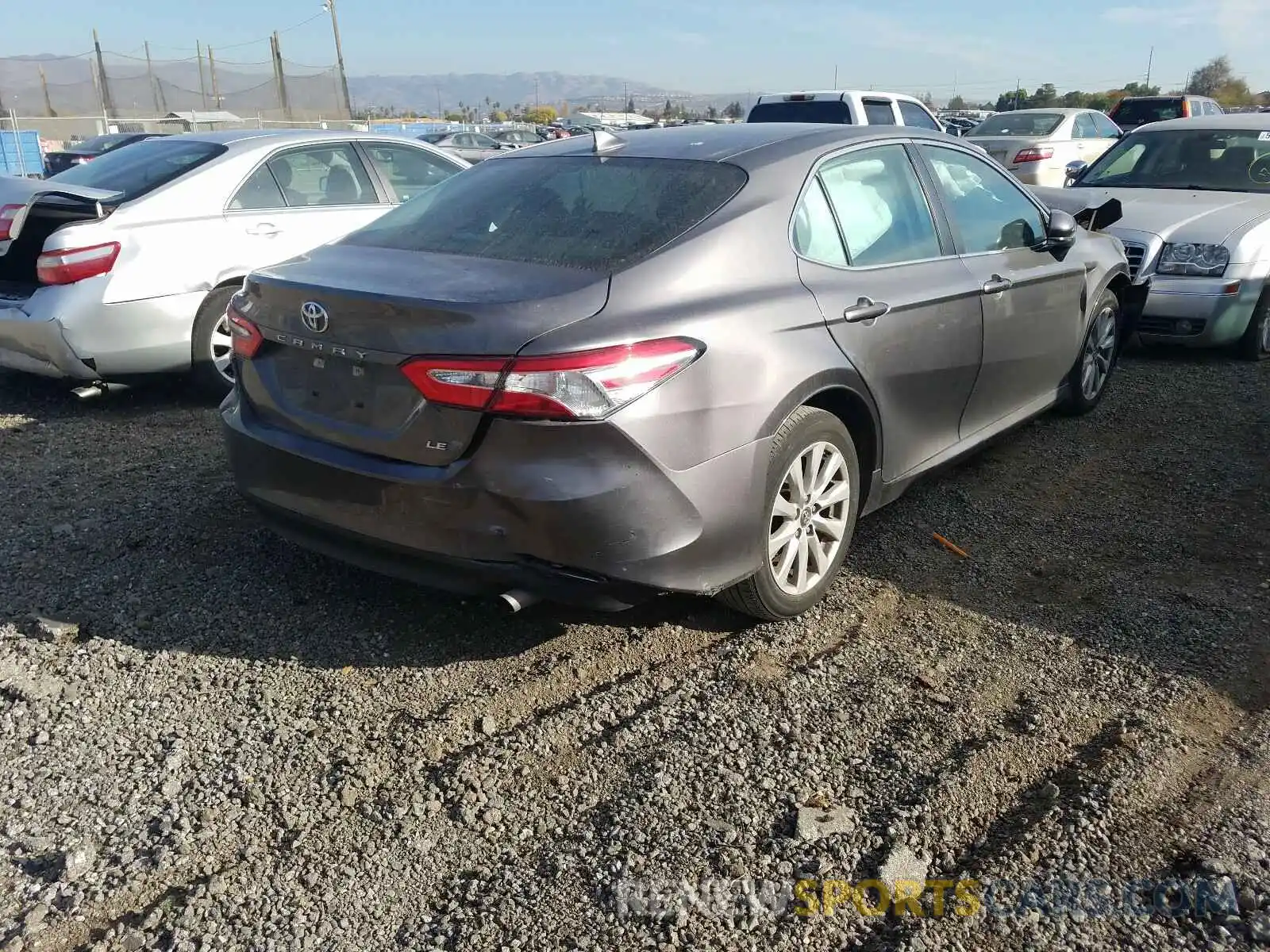 4 Photograph of a damaged car 4T1B11HK0KU744044 TOYOTA CAMRY 2019