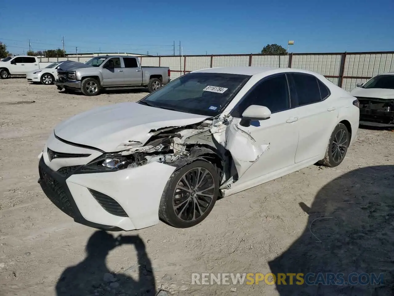 1 Photograph of a damaged car 4T1B11HK0KU744299 TOYOTA CAMRY 2019