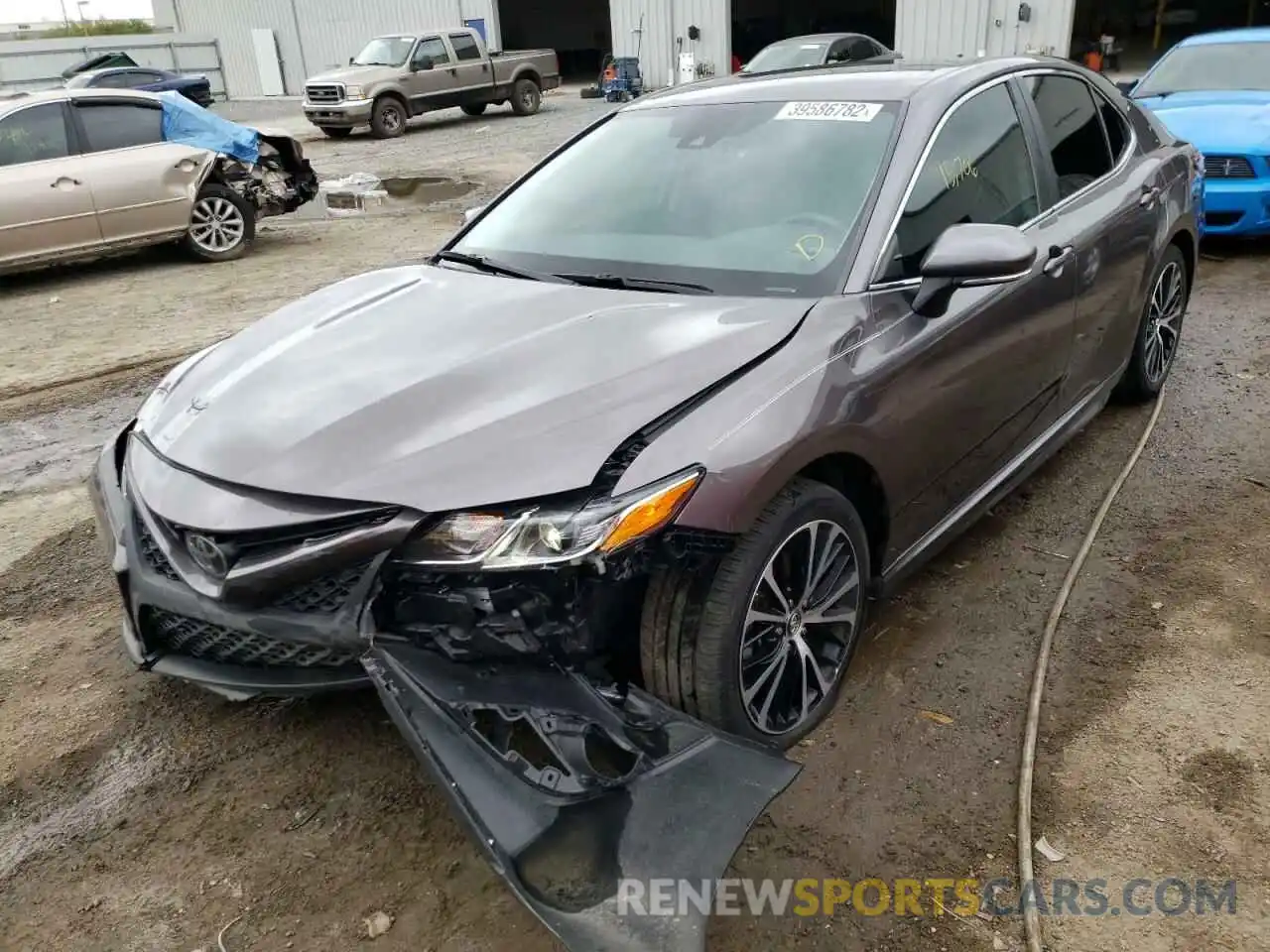 2 Photograph of a damaged car 4T1B11HK0KU747333 TOYOTA CAMRY 2019