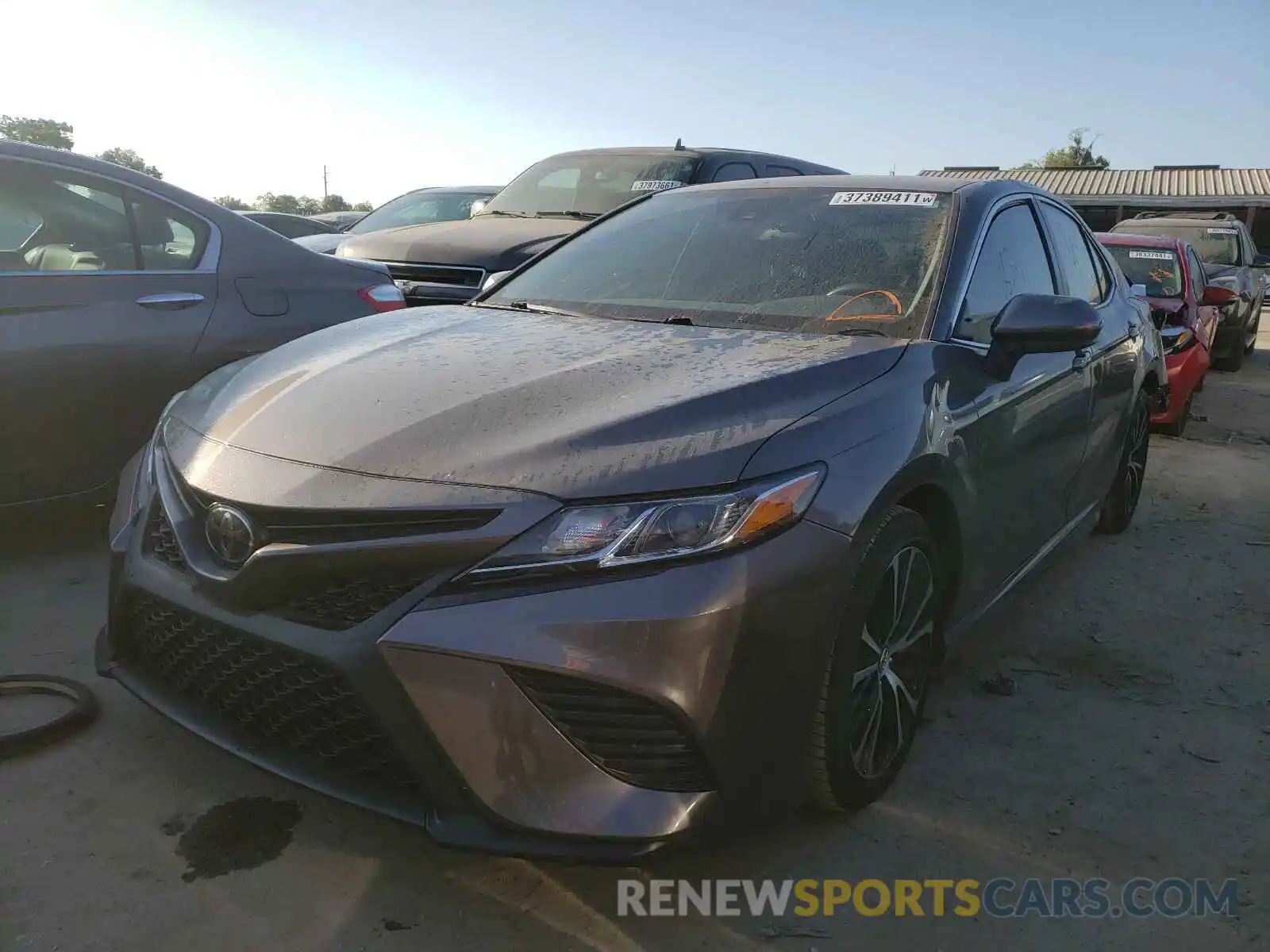 2 Photograph of a damaged car 4T1B11HK0KU747672 TOYOTA CAMRY 2019