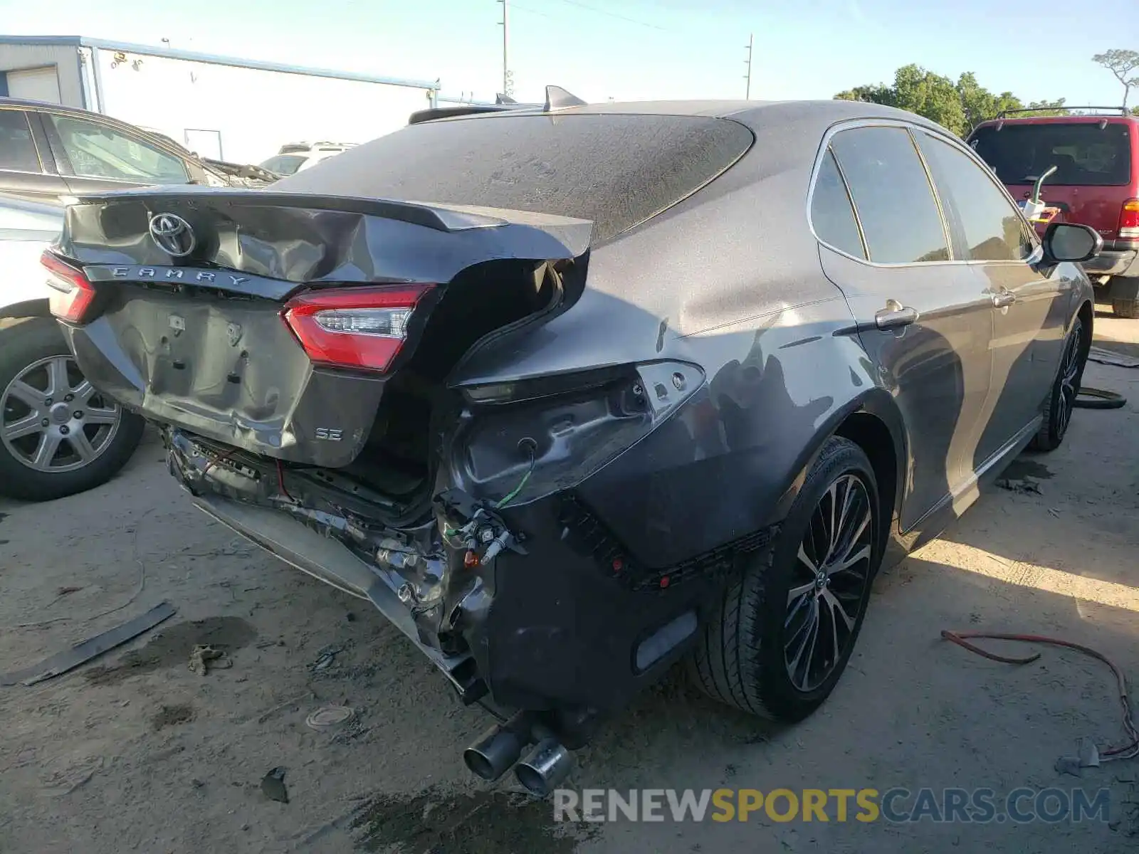 4 Photograph of a damaged car 4T1B11HK0KU747672 TOYOTA CAMRY 2019