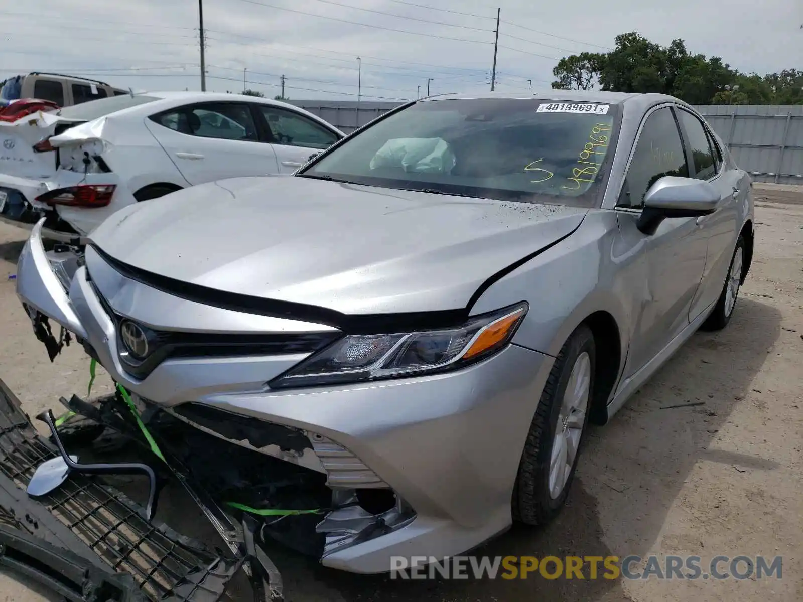 2 Photograph of a damaged car 4T1B11HK0KU753911 TOYOTA CAMRY 2019