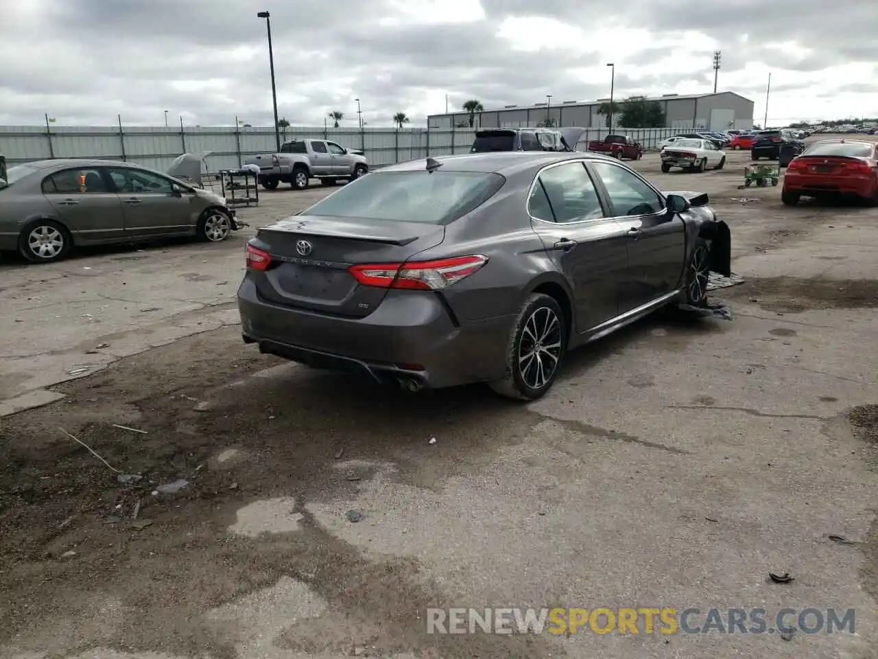 4 Photograph of a damaged car 4T1B11HK0KU754671 TOYOTA CAMRY 2019