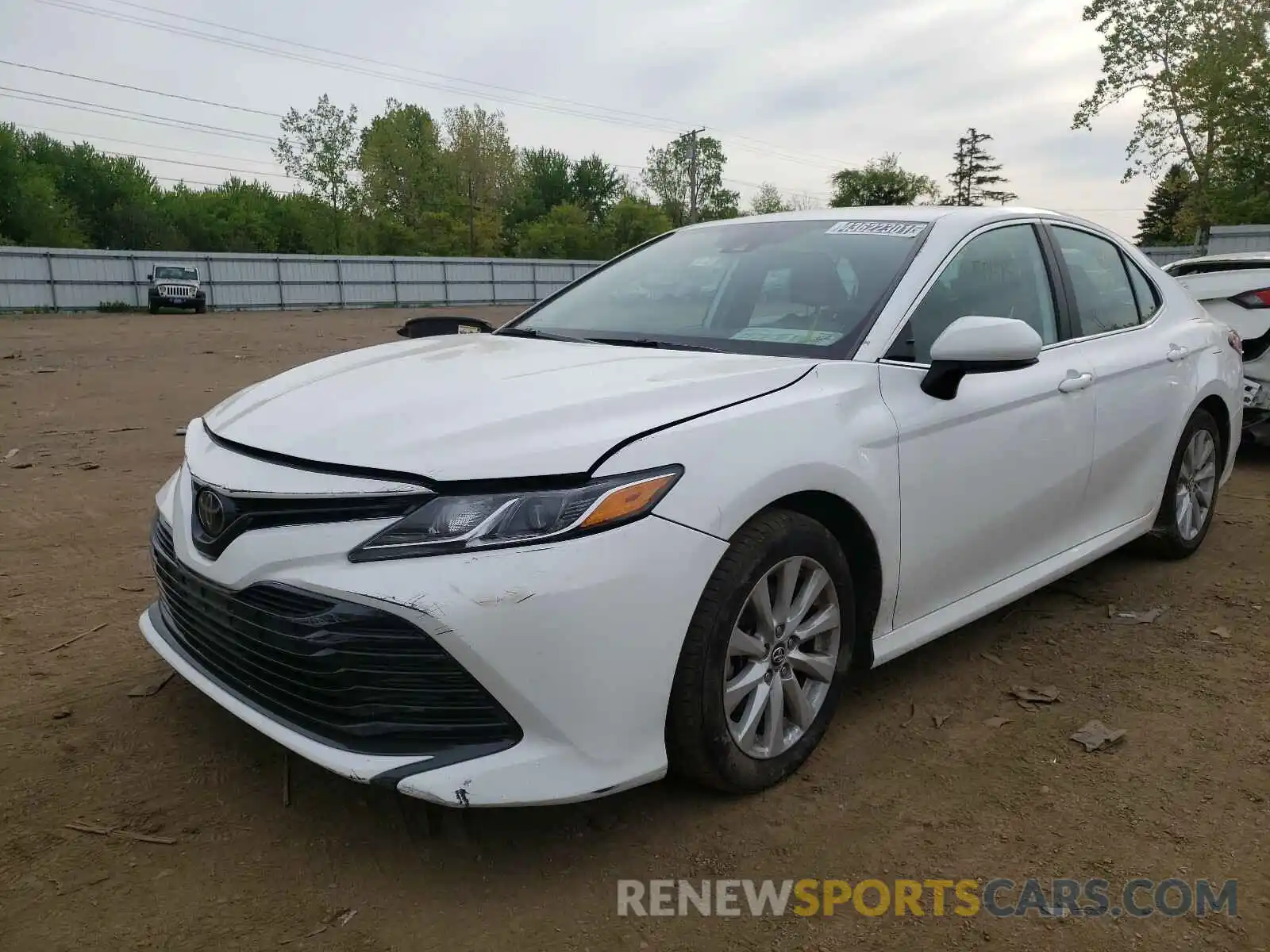 2 Photograph of a damaged car 4T1B11HK0KU756484 TOYOTA CAMRY 2019