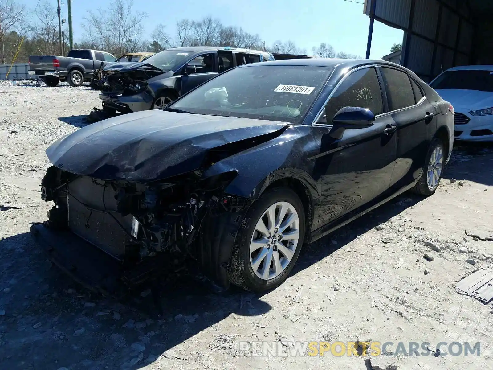 2 Photograph of a damaged car 4T1B11HK0KU765220 TOYOTA CAMRY 2019