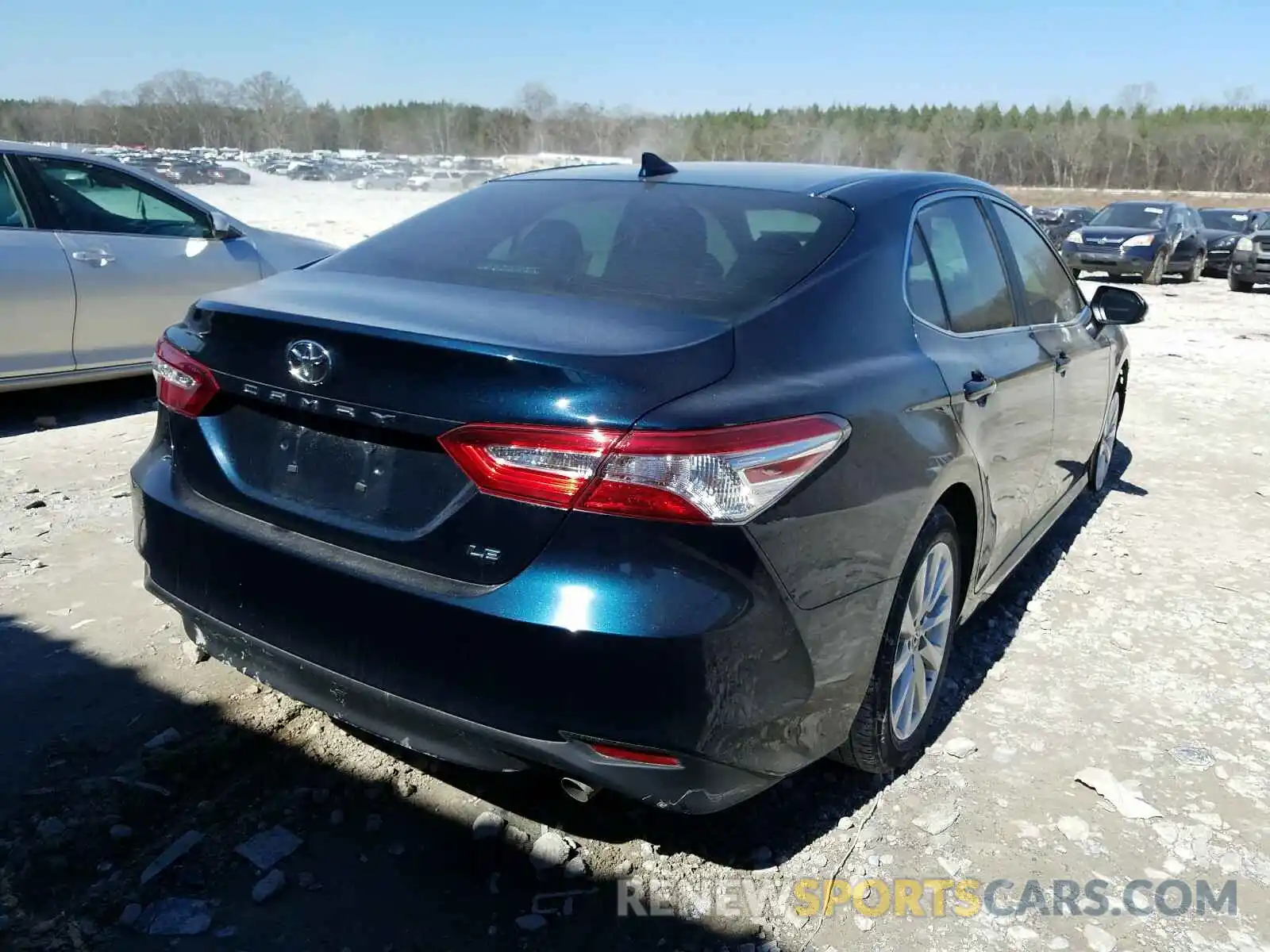 4 Photograph of a damaged car 4T1B11HK0KU765220 TOYOTA CAMRY 2019