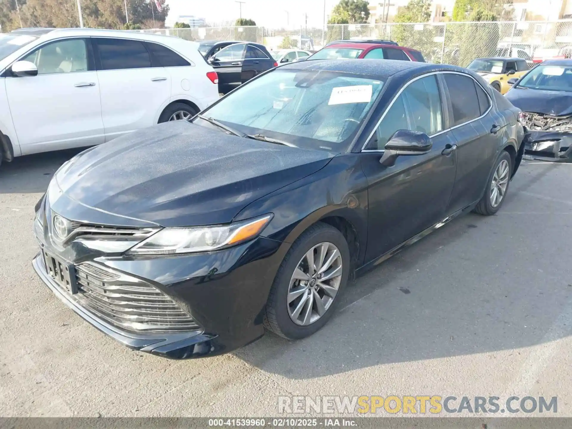 2 Photograph of a damaged car 4T1B11HK0KU767565 TOYOTA CAMRY 2019