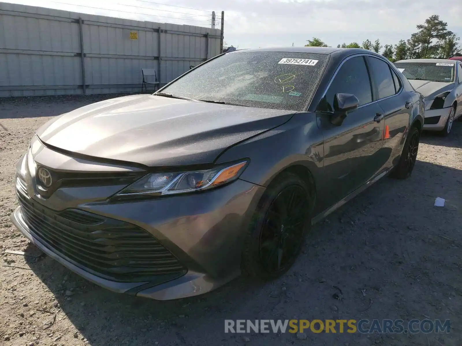 2 Photograph of a damaged car 4T1B11HK0KU772751 TOYOTA CAMRY 2019