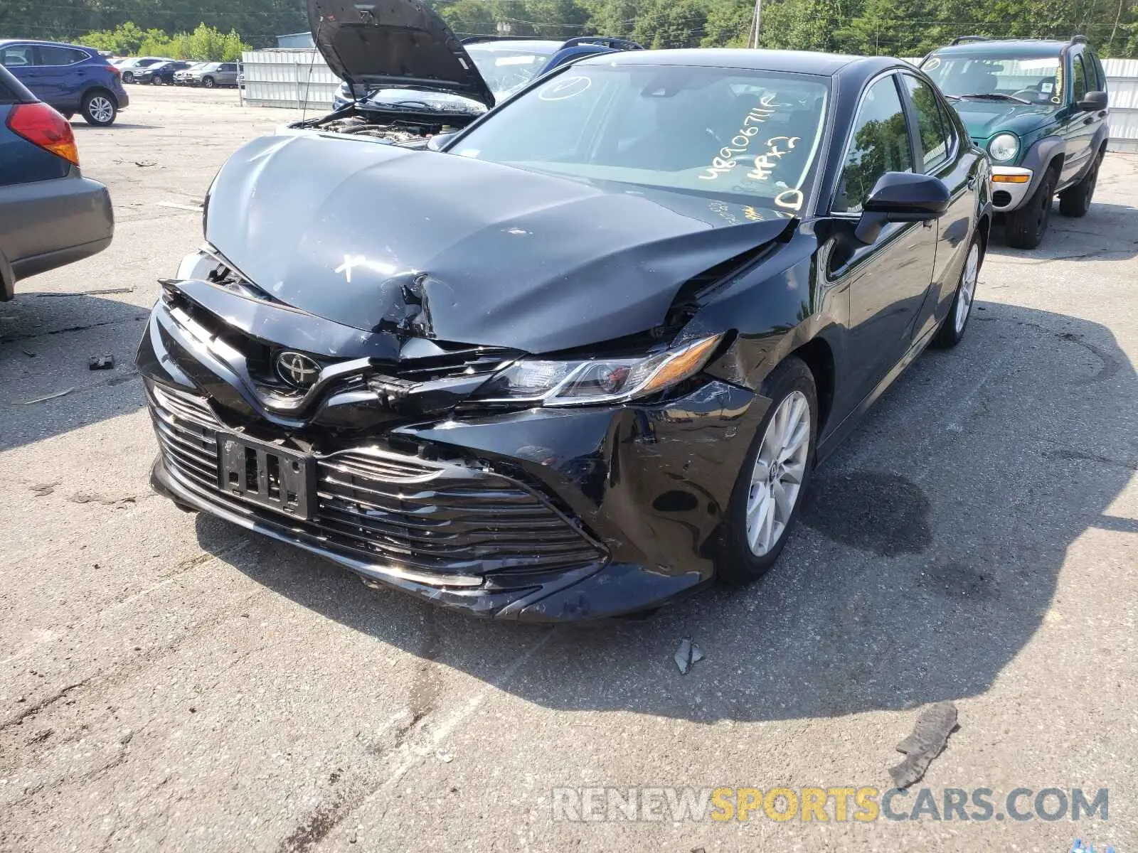 2 Photograph of a damaged car 4T1B11HK0KU776394 TOYOTA CAMRY 2019