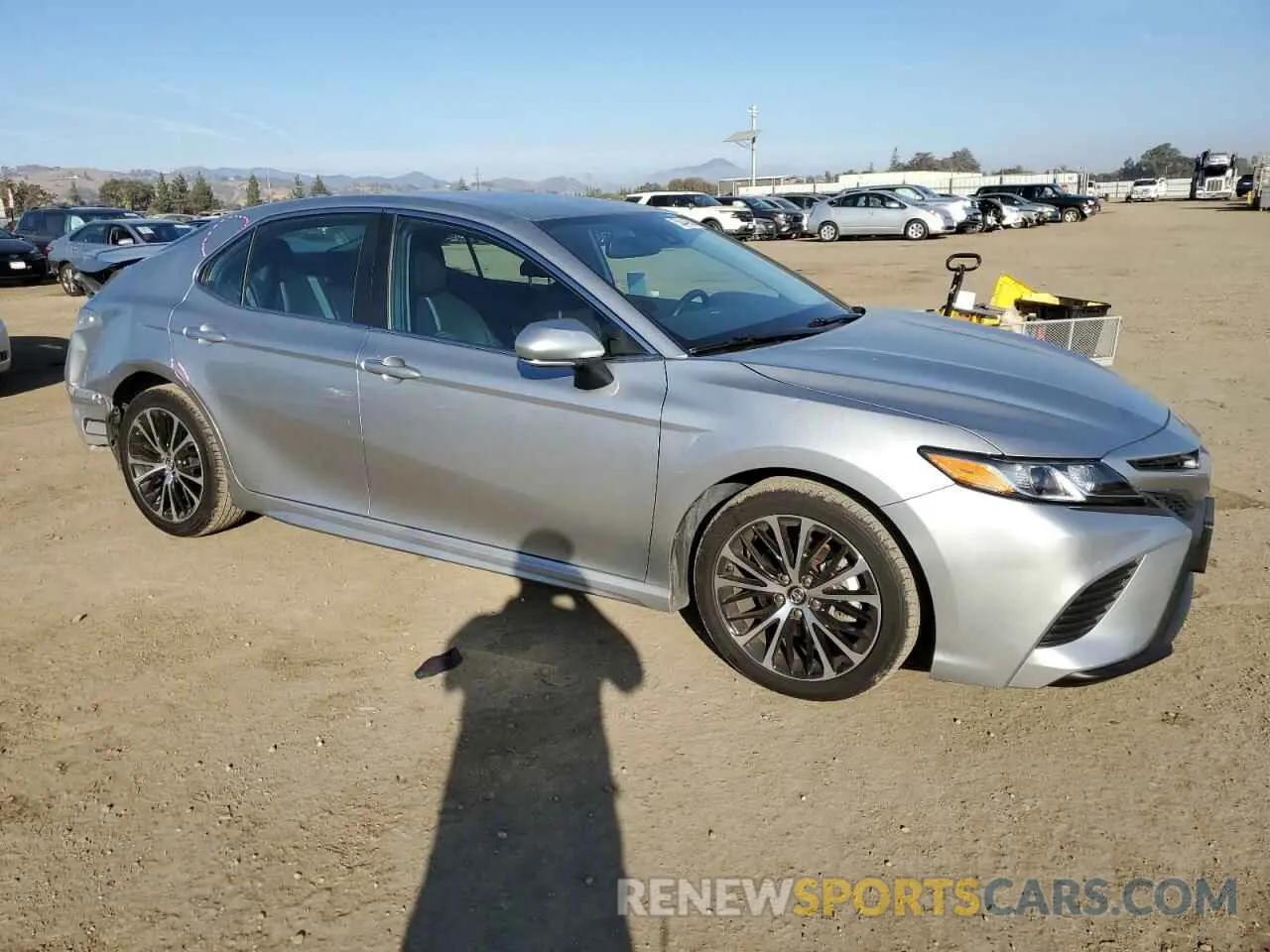 4 Photograph of a damaged car 4T1B11HK0KU779845 TOYOTA CAMRY 2019