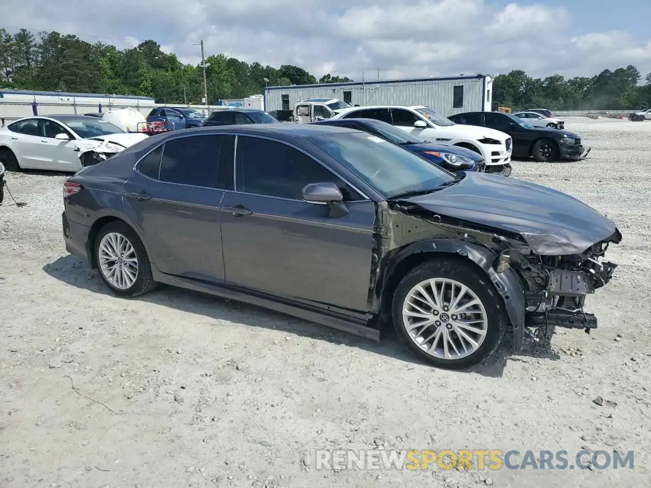 4 Photograph of a damaged car 4T1B11HK0KU783538 TOYOTA CAMRY 2019