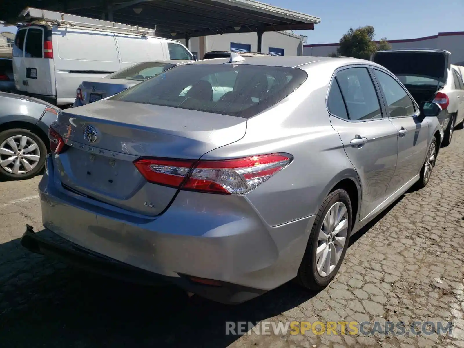 4 Photograph of a damaged car 4T1B11HK0KU783636 TOYOTA CAMRY 2019